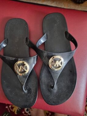 Michael Kors Black Jelly Thong Sandals with Gold MK Medallions
